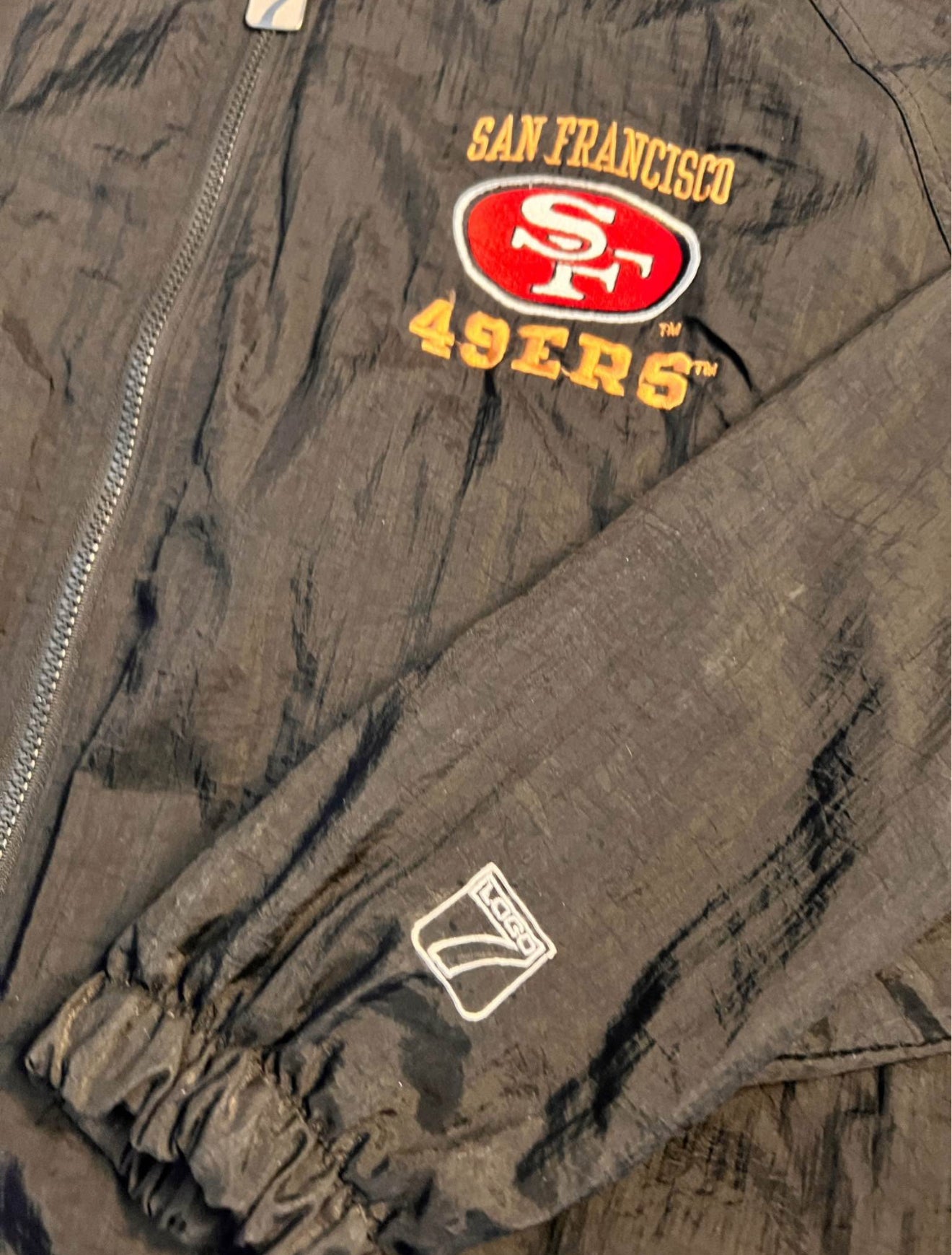 Vintage 90โs Logo 7 - 49ers 5-time Superbowl windbreaker.