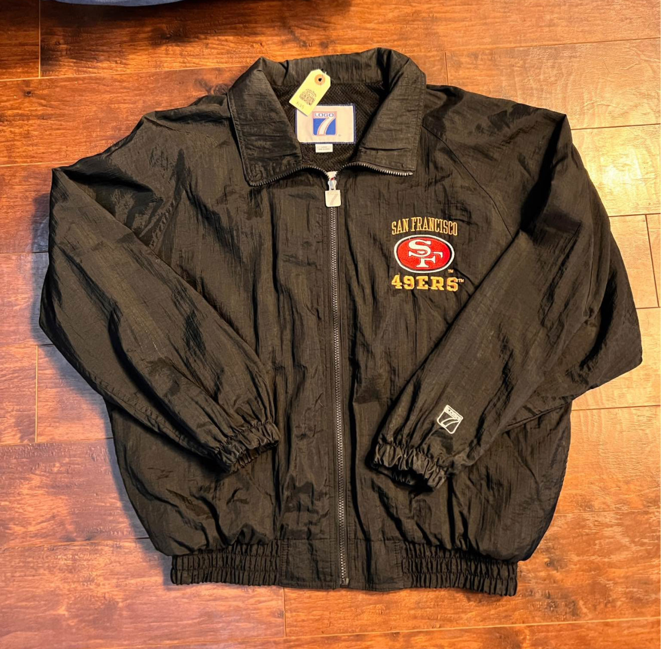 Vintage 90โs Logo 7 - 49ers 5-time Superbowl windbreaker.